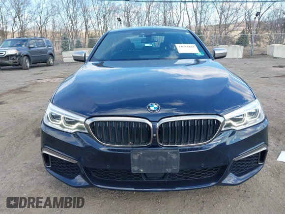 2018 BMW 5 Series M550i xDrive with VIN WBAJB9C52JB035930, listed as a IAAI auction lot 41674415 with 56,294 mi miles and . Bid and sale history available at DreamBid. Image 6.