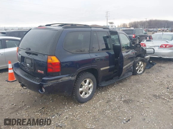 2007 GMC Envoy SLE with VIN 1GKDT13S372158038, listed as a IAAI auction lot 42103078 with 119,954 mi miles. Bid and sale history available at carsss.com. Image 4.