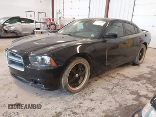 2013 Dodge Charger SXT z VIN 2C3CDXHG7DH529544, wystawiony jako IAAI lot #42484373 z przebiegiem 162 431 mil mil oraz . Historia ofert i sprzedaży dostępna na DreamBid. Obrazek 2.