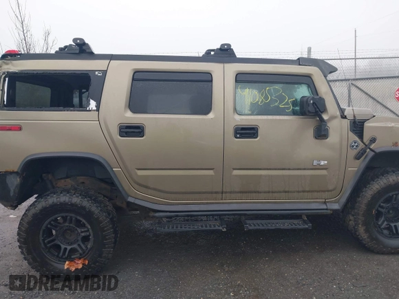 2005 Hummer H2 SUV with VIN 5GRGN23U35H130615, listed as a IAAI auction lot 41085325 with 138,393 mi miles. Bid and sale history available at carsss.com. Image 13.