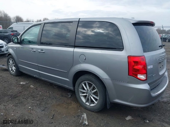 2014 Dodge Grand Caravan SE with VIN 2C4RDGBG5ER424477, listed as a IAAI auction lot 41853890 with 40,745 mi miles. Bid and sale history available at carsss.com. Image 3.