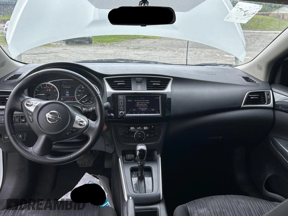 2019 Nissan Sentra SV z VIN 3N1AB7AP5KY428791, wystawiony jako Copart lot #60102005 z przebiegiem 130 972 mil mil oraz Czysty tytuł • Clean title. Historia ofert i sprzedaży dostępna na DreamBid. Obrazek 9.