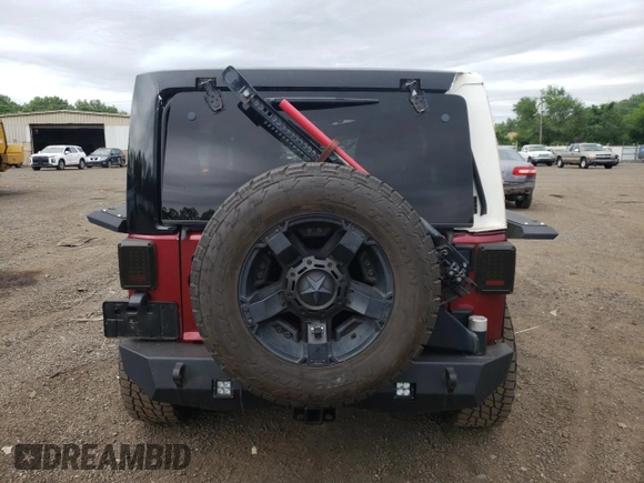 2012 Jeep Wrangler Unlimited Sport with VIN 1C4BJWDG6CL234419, listed as a Copart auction lot 62284825 with 66,649 mi miles and Salvage title. Bid and sale history available at DreamBid. Image 6.