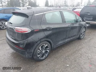2023 Chevrolet Bolt EV 2LT with VIN 1G1FX6S02P4155876, listed as a IAAI auction lot 41175436 with 27,816 mi miles. Bid and sale history available at carsss.com. Image 4.