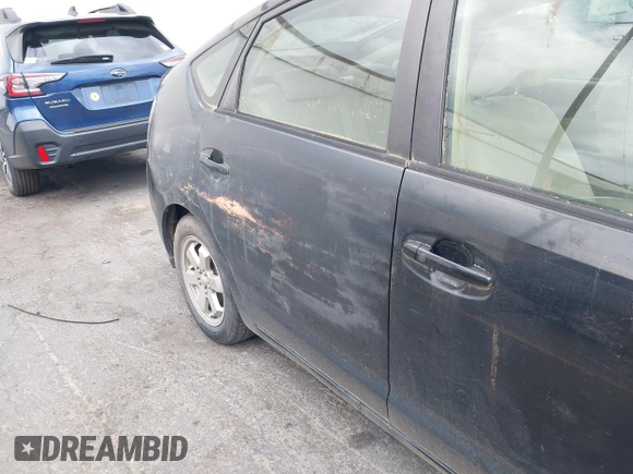 2004 Toyota Prius z VIN JTDKB20U440013681, wystawiony jako IAAI lot #42317573 z przebiegiem Nie podano mil oraz . Historia ofert i sprzedaży dostępna na DreamBid. Obrazek 13.