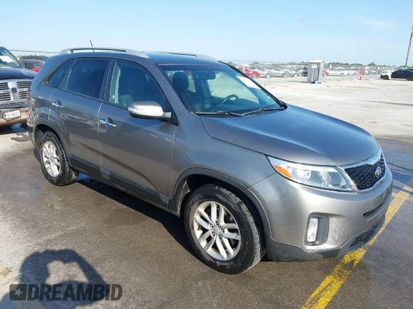 2014 Kia Sorento LX with VIN 5XYKT4A67EG528288, listed as a IAAI auction lot 42036077 with 67,835 mi miles. Bid and sale history available at carsss.com. Image 1.