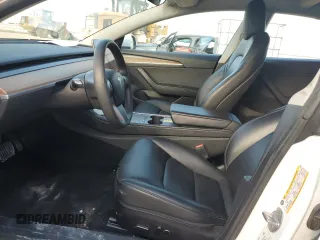 2022 Tesla Model 3 with VIN 5YJ3E1EA7NF184741, listed as a Copart auction lot 82487494 with 133,215 mi miles and Clean Title. Bid and sale history available at DreamBid. Image 7.
