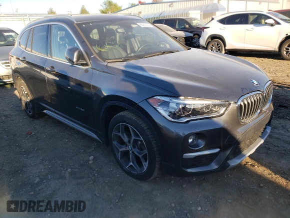 2016 BMW X1 xDrive28i with VIN WBXHT3C30GP881353, listed as a Copart auction lot 65233532 with 52,036 mi miles. Bid and sale history available at carsss.com. Image 1.