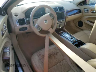 2010 Jaguar XK with VIN SAJWA4GB5ALB36814, listed as a Copart auction lot 74855444 with 0 mi miles and Salvage Title. Bid and sale history available at carsss.com. Image 8.