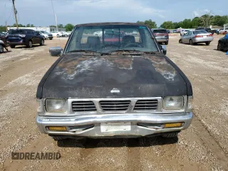 1995 Nissan Frontier z VIN 1N6SD11S6SC430228, wystawiony jako Copart lot #60110335 z przebiegiem 202 139 mil mil oraz Czysty tytuł • Clean title. Historia ofert i sprzedaży dostępna na DreamBid. Obrazek 5.