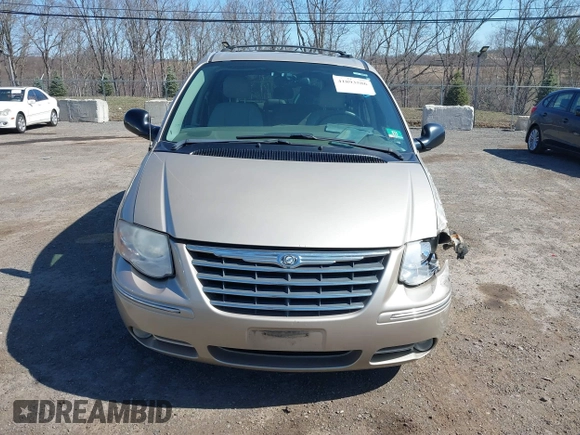 2006 Chrysler Town & Country Touring with VIN 2A8GP54L06R727898, listed as a IAAI auction lot 41893586 with 119,296 mi miles and . Bid and sale history available at DreamBid. Image 12.