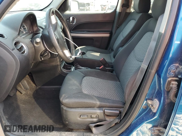 2009 Chevrolet HHR 2LT with VIN 3GNCA53V19S525922, listed as a Copart auction lot 63428195 with 241,042 mi miles and Salvage title. Bid and sale history available at DreamBid. Image 7.