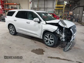 2021 Hyundai Palisade Limited z VIN KM8R5DHEXMU210597, wystawiony jako IAAI lot #41869656 z przebiegiem 56 874 mil mil oraz . Historia ofert i sprzedaży dostępna na DreamBid. Obrazek 1.