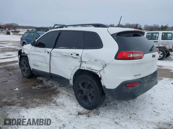 2016 Jeep Cherokee Altitude with VIN 1C4PJLAB4GW376723, listed as a IAAI auction lot 41593248 with 96,940 mi miles and . Bid and sale history available at DreamBid. Image 3.