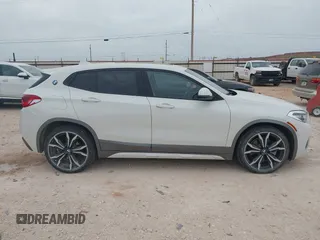 2018 BMW X2 xDrive28i z VIN WBXYJ5C31JEF82624, wystawiony jako IAAI lot #42066439 z przebiegiem 79 454 mil mil oraz . Historia ofert i sprzedaży dostępna na DreamBid. Obrazek 13.
