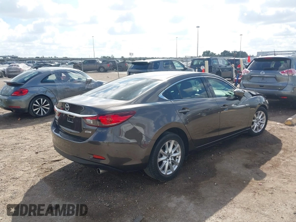 2016 Mazda Mazda6 i Sport with VIN JM1GJ1U56G1422012, listed as a IAAI auction lot 40693636 with 93,094 mi miles. Bid and sale history available at carsss.com. Image 4.