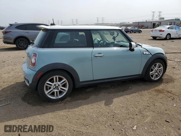 2013 MINI Hardtop S with VIN WMWSV3C52DT396033, listed as a Copart auction lot 61041585 with 83,873 mi miles and Salvage title. Bid and sale history available at DreamBid. Image 3.