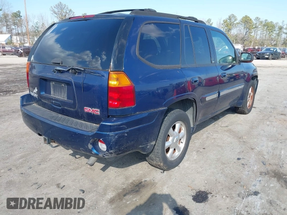 2003 GMC Envoy SLE with VIN 1GKDT13S432364768, listed as a IAAI auction lot 41467418 with 220,170 mi miles. Bid and sale history available at carsss.com. Image 4.