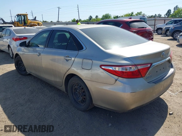 2016 Toyota Camry XLE with VIN 4T4BF1FKXGR519647, listed as a IAAI auction lot 42010266 with 123,595 mi miles and . Bid and sale history available at DreamBid. Image 3.