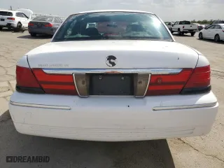 2004 Mercury Grand Marquis GS with VIN 2MEFM74W34X637265, listed as a Copart auction lot 72248594 with 139,039 mi miles and Salvage Title. Bid and sale history available at carsss.com. Image 6.