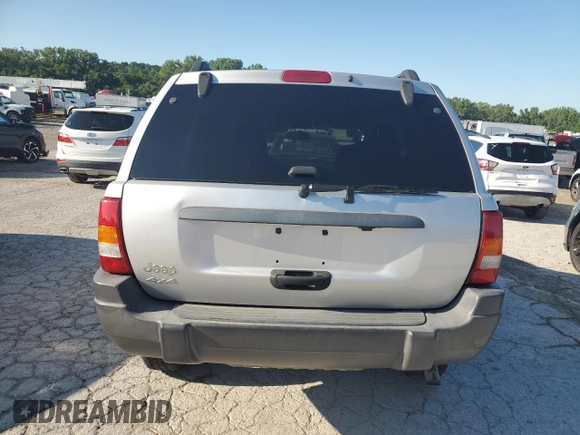 2004 Jeep Grand Cherokee Laredo z VIN 1J4GW48S94C425242, wystawiony jako Copart lot #63118015 z przebiegiem 157 076 mil mil oraz Czysty tytuł • Clean title. Historia ofert i sprzedaży dostępna na DreamBid. Obrazek 6.