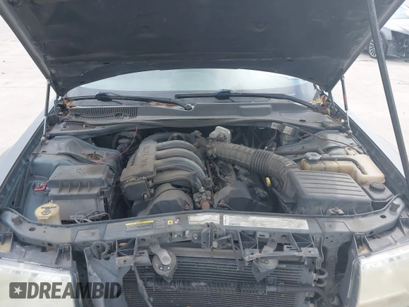 2006 Chrysler 300 with VIN 2C3KA43R56H217771, listed as a IAAI auction lot 41859397 with 154,227 mi miles. Bid and sale history available at carsss.com. Image 10.