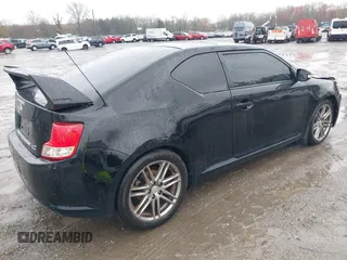 2013 Scion tC with VIN JTKJF5C79D3051664, listed as a IAAI auction lot 42027579 with 211,322 mi miles. Bid and sale history available at carsss.com. Image 4.
