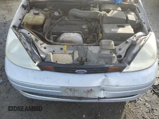 2000 Ford Focus SE Fleet с VIN 1FAHP3639YW261420, выставлен на аукционе Copart как лот 80135064 с пробегом 153 418 миль миль и Списание • Salvage title. История ставок и продаж доступна на DreamBid. Изображение 11.