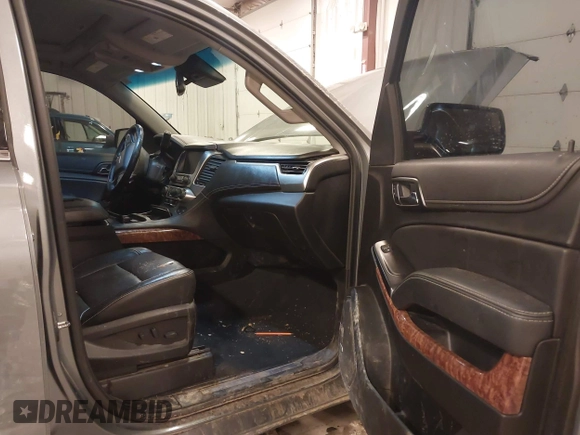 2019 Chevrolet Suburban Premier with VIN 1GNSKJKC1KR291629, listed as a IAAI auction lot 41565675 with 129,672 mi miles and . Bid and sale history available at DreamBid. Image 5.