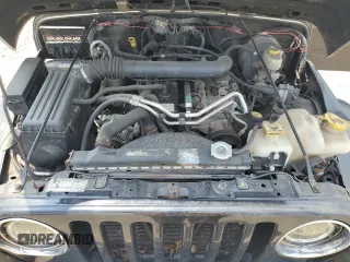 2005 Jeep Wrangler X z VIN 1J4FA39S75P321328, wystawiony jako Copart lot #59711505 z przebiegiem 126 768 mil mil oraz Szkoda całkowita • Salvage title. Historia ofert i sprzedaży dostępna na DreamBid. Obrazek 12.