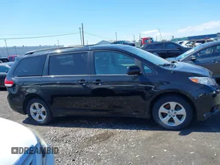 2014 Toyota Sienna LE AAS with VIN 5TDKK3DC4ES445998, listed as a IAAI auction lot 42093872 with 220,943 mi miles. Bid and sale history available at carsss.com. Image 13.
