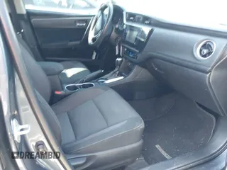 2019 Toyota Corolla L with VIN 2T1BURHE4KC134729, listed as a IAAI auction lot 41779629 with 240,685 mi miles. Bid and sale history available at carsss.com. Image 5.