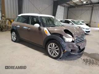 2012 MINI Countryman with VIN WMWZB3C52CWM01672, listed as a Copart auction lot 56064265 with 97,267 mi miles and Salvage Title. Bid and sale history available at DreamBid. Image 4.