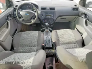 2007 Ford Focus S with VIN 1FAHP34NX7W225626, listed as a Copart auction lot 58202395 with 157,844 mi miles and Salvage title. Bid and sale history available at DreamBid. Image 8.