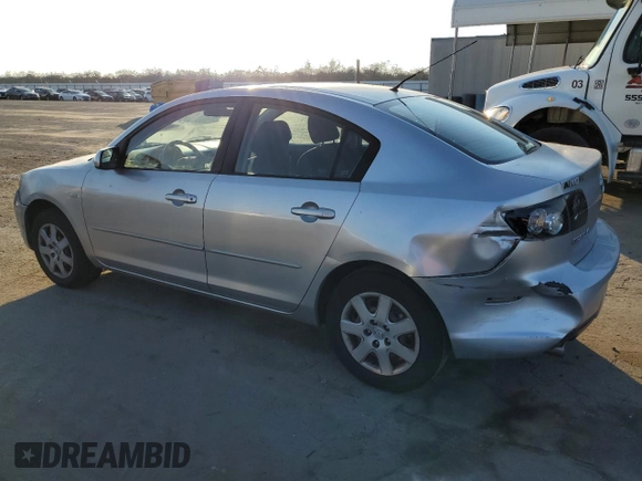 2009 Mazda Mazda3 i Touring Value with VIN JM1BK32G791250048, listed as a Copart auction lot 87440814 with 114,948 mi miles and Salvage Title. Bid and sale history available at carsss.com. Image 2.