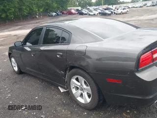 2013 Dodge Charger SE z VIN 2C3CDXBG8DH629628, wystawiony jako IAAI lot #42199220 z przebiegiem 153 556 mil mil oraz . Historia ofert i sprzedaży dostępna na DreamBid. Obrazek 14.