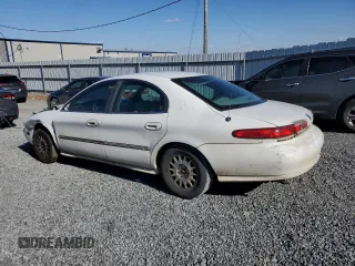 1999 Mercury Sable LS z VIN 1MEFM53S2XA624653, wystawiony jako Copart lot #45967215 z przebiegiem 264 081 mil mil oraz Szkoda całkowita • Salvage title. Historia ofert i sprzedaży dostępna na DreamBid. Obrazek 2.
