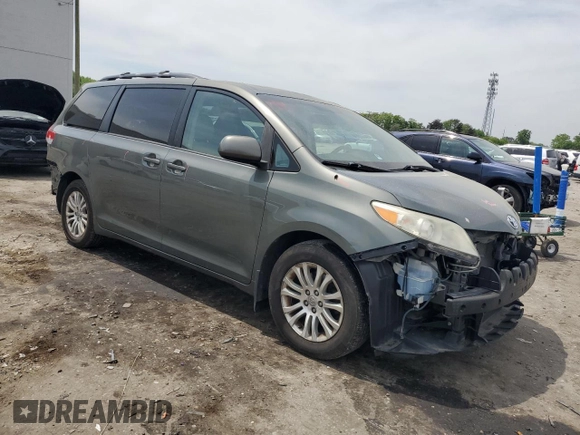 2011 Toyota Sienna XLE AAS with VIN 5TDYK3DC6BS124373, listed as a Copart auction lot 54265975 with 213,798 mi miles and Clean Title. Bid and sale history available at carsss.com. Image 4.