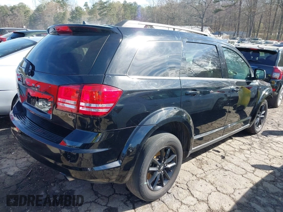 2020 Dodge Journey SE Value with VIN 3C4PDCAB1LT232358, listed as a IAAI auction lot 41821361 with 54,459 mi miles and . Bid and sale history available at DreamBid. Image 4.