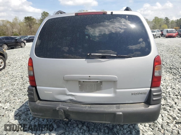 2001 Pontiac Montana with VIN 1GMDX03E61D318330, listed as a Copart auction lot 52063885 with 98,926 mi miles and Salvage Title. Bid and sale history available at DreamBid. Image 6.