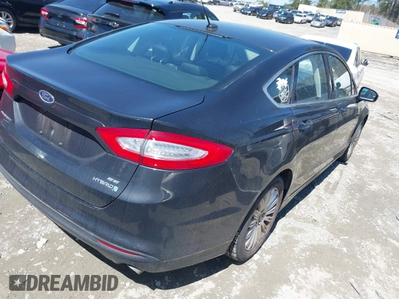 2015 Ford Fusion SE Hybrid with VIN 3FA6P0LU8FR148917, listed as a IAAI auction lot 41876627 with 253,952 mi miles. Bid and sale history available at carsss.com. Image 4.