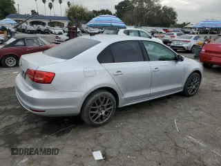 2015 Volkswagen Jetta SE with VIN 3VWD17AJ5FM260475, listed as a Copart auction lot 84764864 with 119,189 mi miles and Salvage title. Bid and sale history available at DreamBid. Image 3.