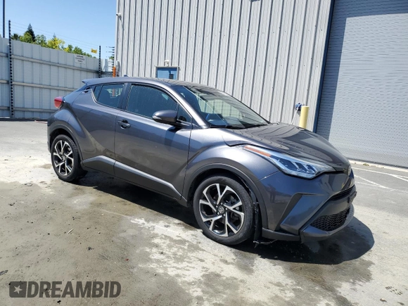 2021 Toyota C-HR LE with VIN JTNKHMBX1M1115317, listed as a Copart auction lot 56200305 with 82,237 mi miles and Clean Title. Bid and sale history available at DreamBid. Image 4.
