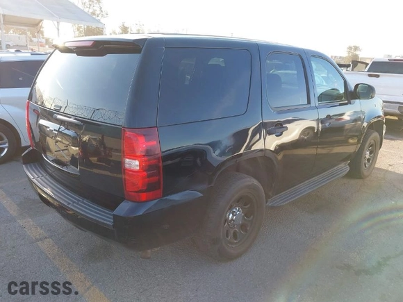 2012 Chevrolet Tahoe Commercial with VIN 1GNLC2E0XCR245940, listed as a IAAI auction lot 41851106 with 85,441 mi miles. Bid and sale history available at carsss.com. Image 4.