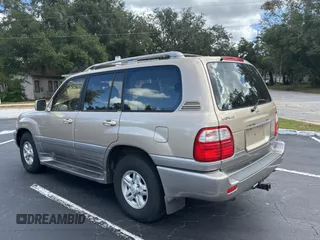 1998 Lexus LX 470 z VIN JT6HT00W7W0008417, wystawiony jako Copart lot #79324334 z przebiegiem 183 911 mil mil oraz Czysty tytuł • Clean title. Historia ofert i sprzedaży dostępna na DreamBid. Obrazek 3.
