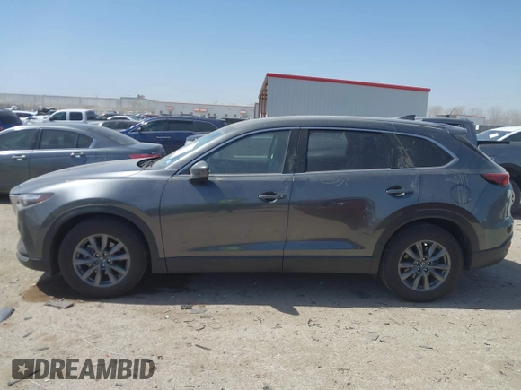 2021 Mazda CX-9 Touring with VIN JM3TCACY2M0502016, listed as a IAAI auction lot 41825456 with 86,068 mi miles. Bid and sale history available at carsss.com. Image 14.