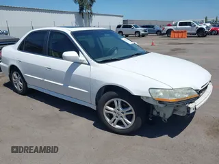 2001 Honda Accord EX with VIN 1HGCG16561A077194, listed as a IAAI auction lot 42598969 with 220,862 mi miles and . Bid and sale history available at DreamBid. Image 1.