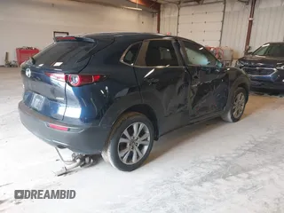2021 Mazda CX-30 Select with VIN 3MVDMBBL8MM317065, listed as a IAAI auction lot 41819958 with 33,047 mi miles and . Bid and sale history available at carsss.com. Image 4.