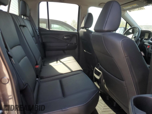 2023 Honda Ridgeline RTL-E with VIN 5FPYK3F74PB006003, listed as a Copart auction lot 55276305 with 26,095 mi miles and Clean title. Bid and sale history available at DreamBid. Image 10.