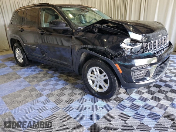 2023 Jeep Grand Cherokee Laredo with VIN 1C4RJHAG7P8866871, listed as a Copart auction lot 58341235 with 48,737 mi miles and Salvage title. Bid and sale history available at DreamBid. Image 4.
